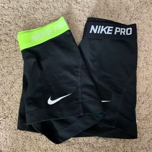 Two Black Nike Pro Spandex